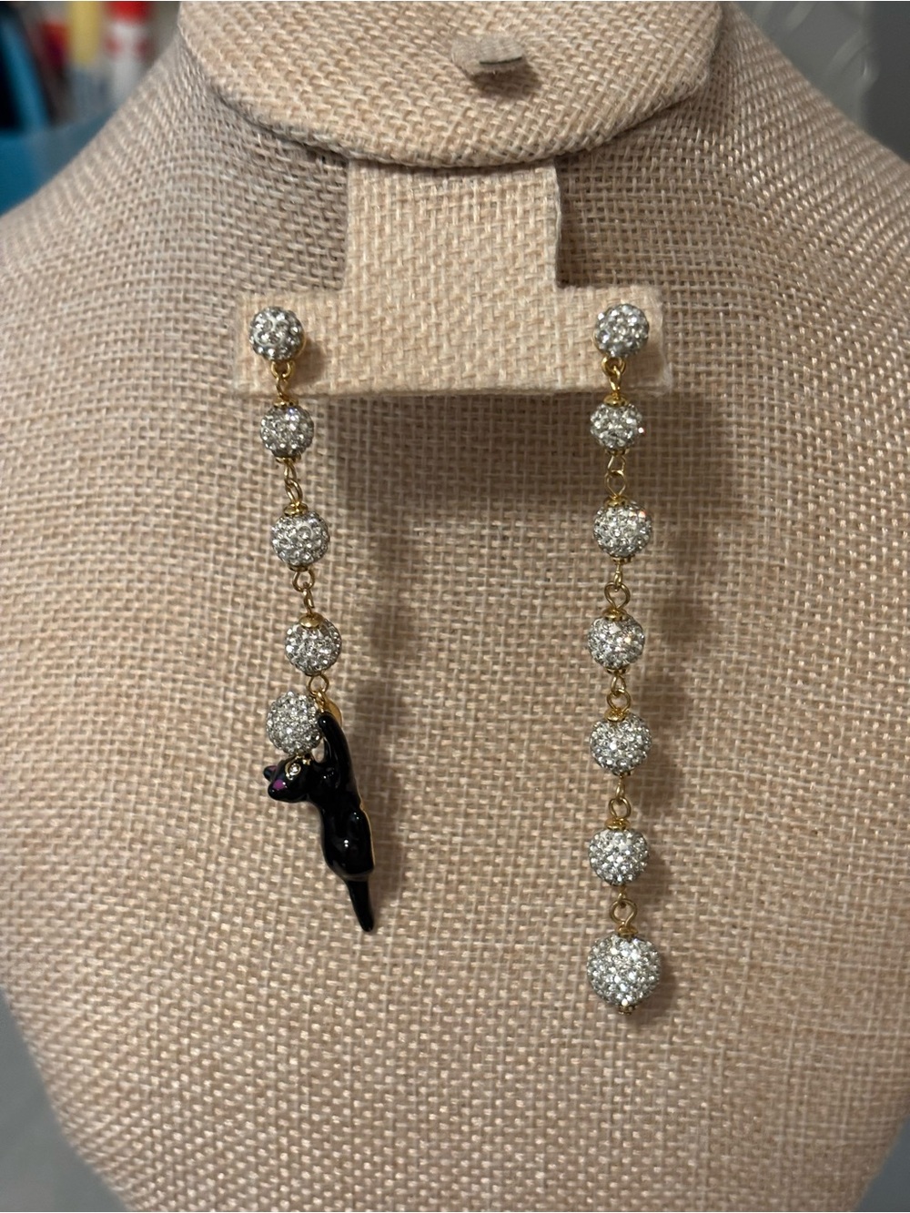 Gold and White Crystal Drop Earrings with Black Cat Accent
